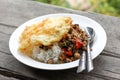 Fried Stir Basil with Minced porkÃÂ and fried egg on top .